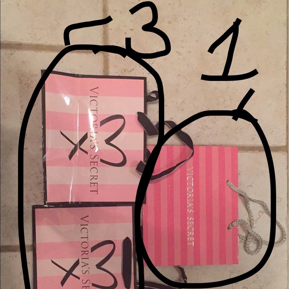 4 SMALL VICTORIA'S SECRET BAGS - willing to sep.